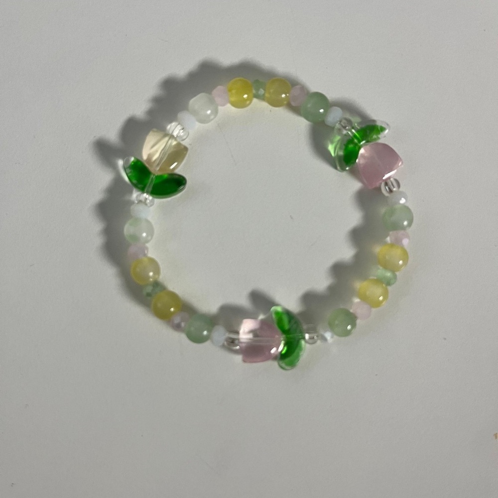 Pastel Beaded Bracelet with Floral Accents